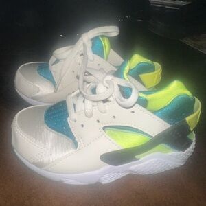 Nike Kids White, Blue, and Yellow Sneakers